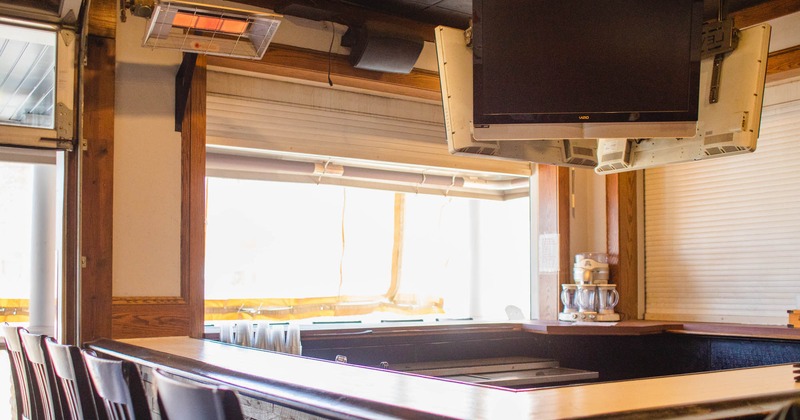 Interior, bar area with a big TV, different angle