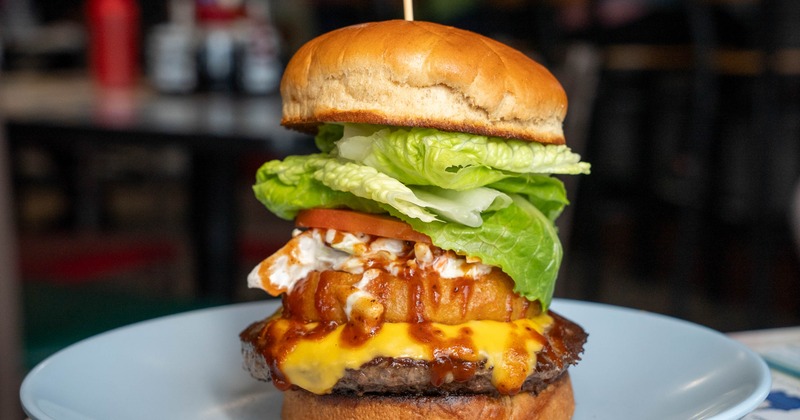 Picnic Burger served in a white plate
