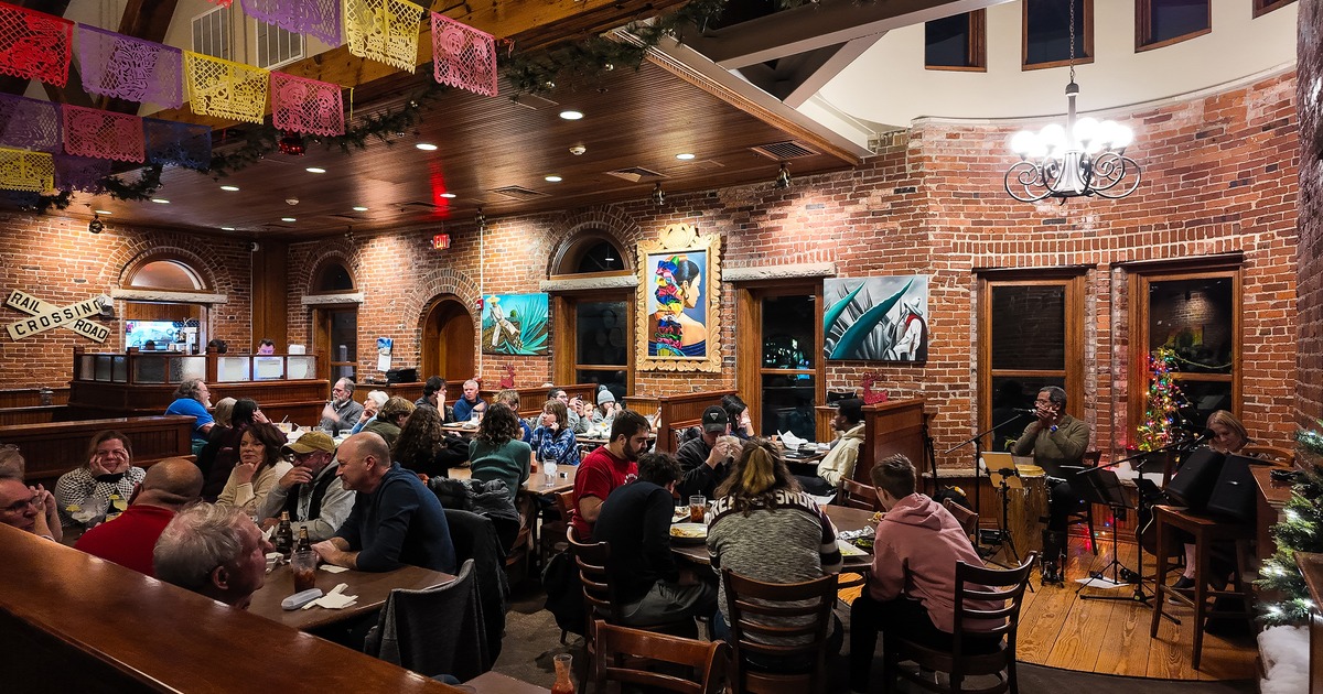 Spacious seating area with guests enjoying their food and drinks
