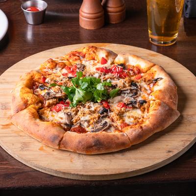 Italian Sausage Pizza, with mushrooms, roasted peppers, and mozzarella.