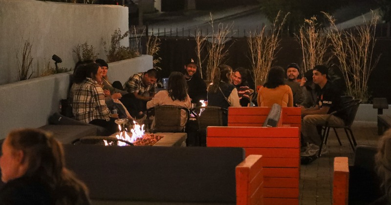 Interior, tables, benches, guests