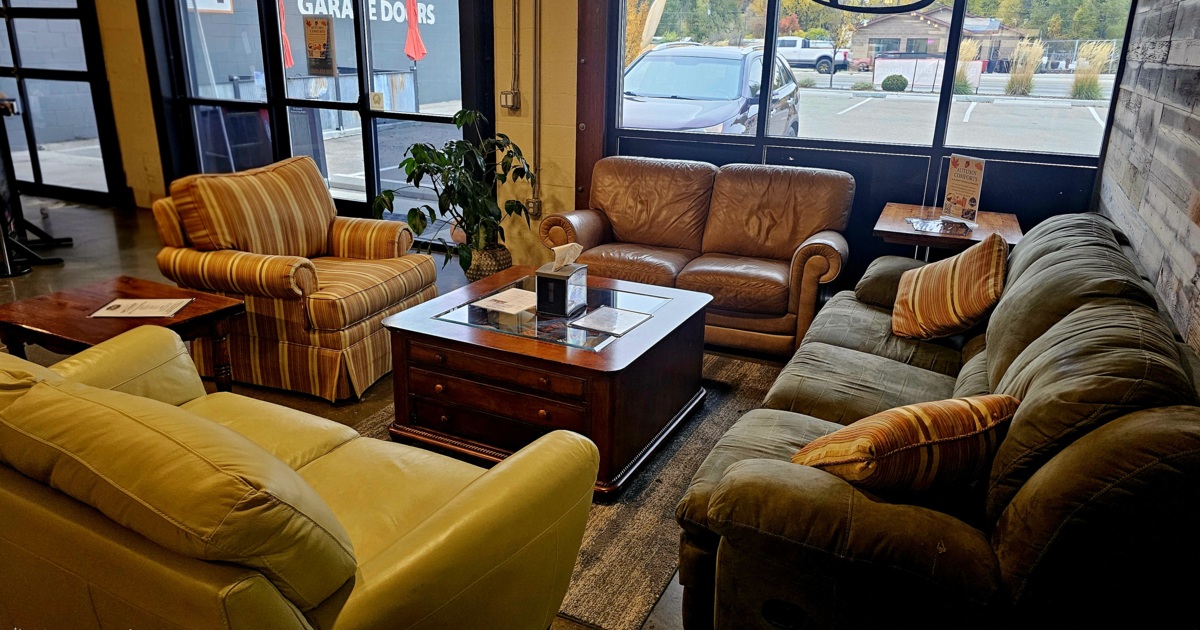 Lounge are with couches, comfy chairs, coffee table and side tables