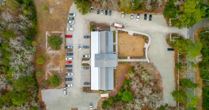 Aerial view of the venue, building and parking lot