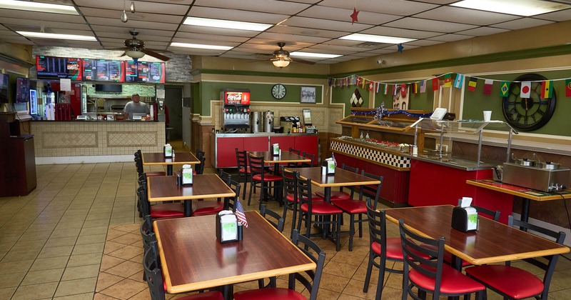 Interior, tables with chairs waiting for the guests