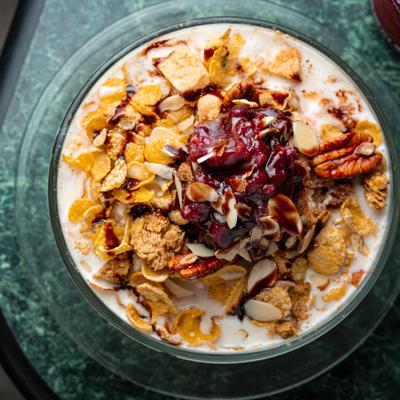 Korean shaved ice dessert topped with various nuts.