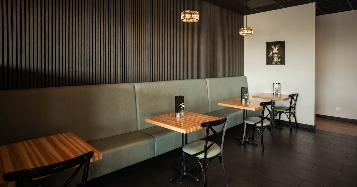 Interior, tables and chairs ready for guests