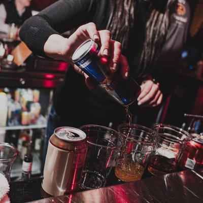 Staff member working, preparing cocktails