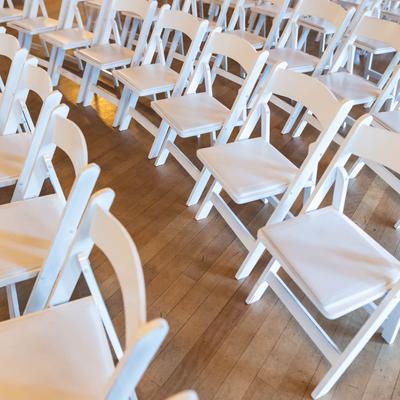 Interior, white wedding chairs.