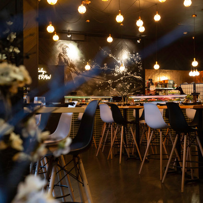 Tables and chairs lined up, ready for guests.