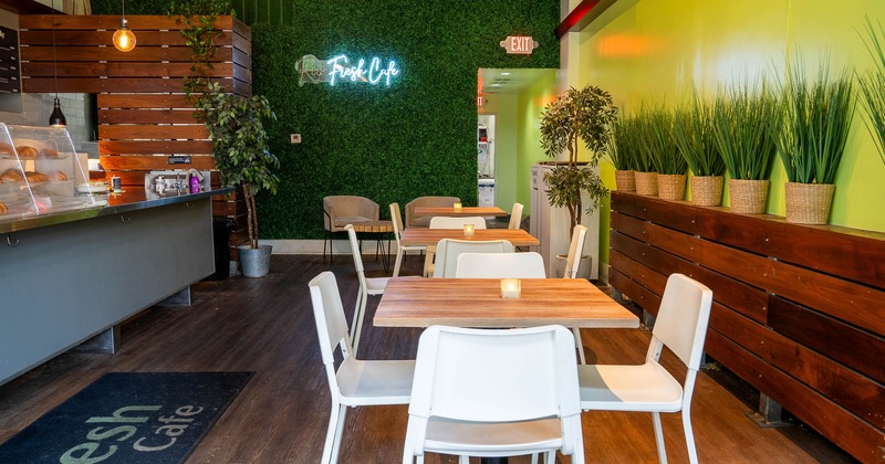 Interior, tables and chairs in seating area