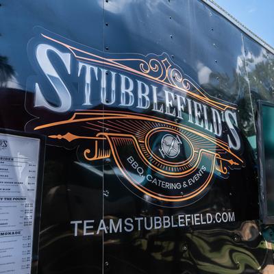 Stubblefield’s food truck with a menu board.