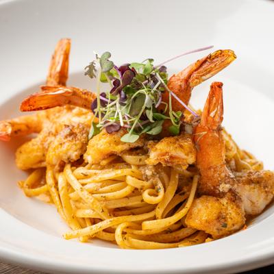 Shrimp pasta, plate, close up.