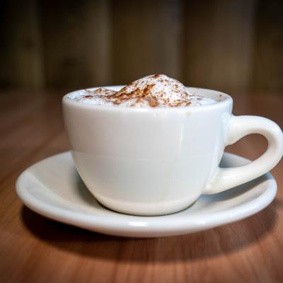 Cappuccino with cocoa-dusted foam.