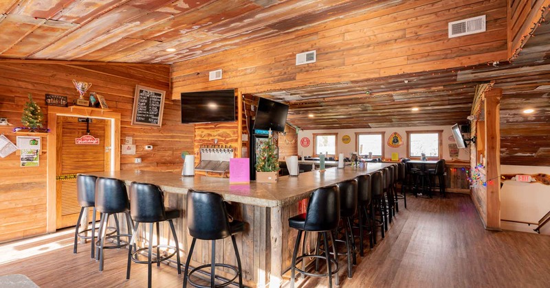 Interior, bar area, stools by the bar