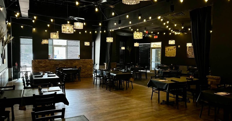 Interior, tables ready in the dining area