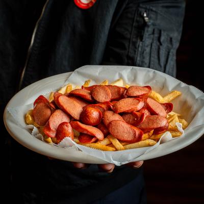 Salchipapa thinly sliced fried beef sausages.