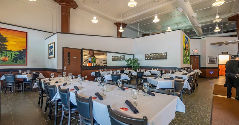 Restaurant interior, dining area with set tables