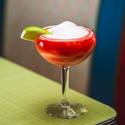 Strawberry Margarita with lime garnish