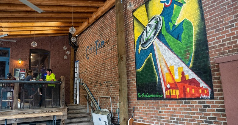 Interior, wall decoration, guests sitting in the seating area
