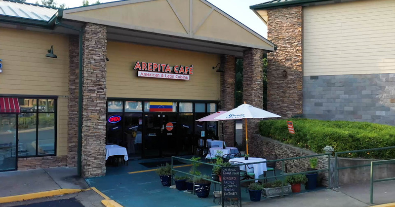 Exterior, main entrance with the restaurant name above