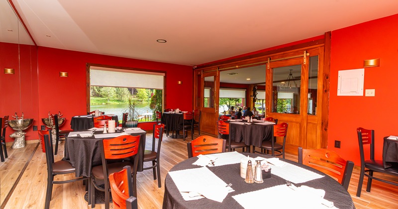 Restaurant interior, private dining room with set tables