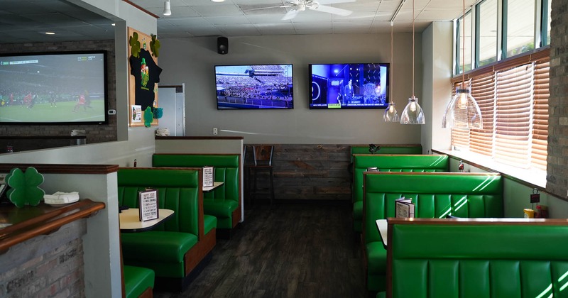 Interior, booths, big Tv's on the wall