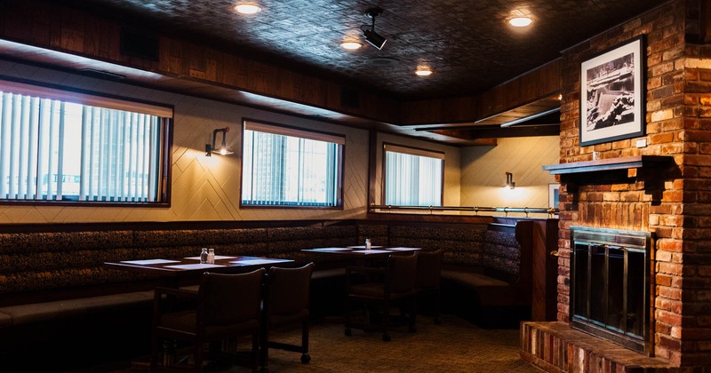 Interior, tables by the fireplace