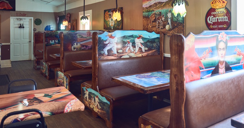 Mexican style interior dining area, lined up dining booths