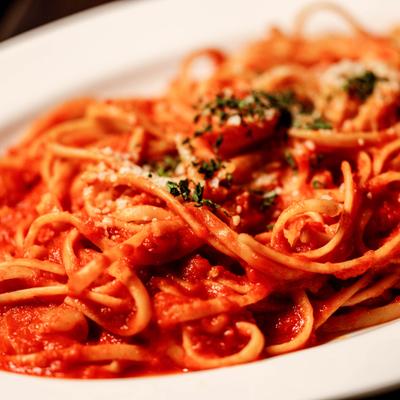 Fra Diavolo Shrimp Linguini seasoned with dried herbs and a sprinkling of cheese.