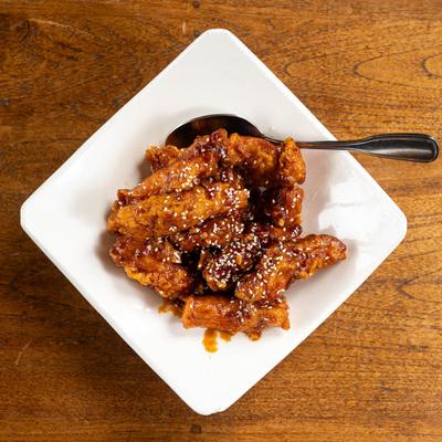 Fried chicken in spicy citrus sauce.