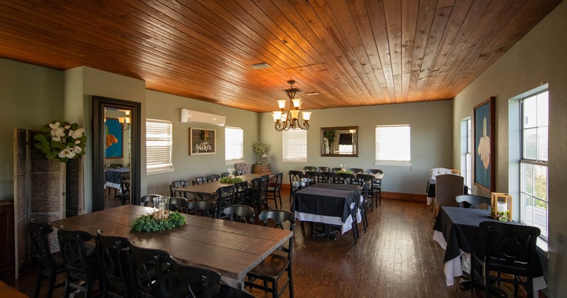 Interior, dining area, long table setups, stylish decoration, wooden flooring