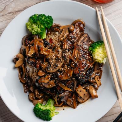 Grilled short ribs with steamed veggies, onions, mushrooms, and steamed rice.