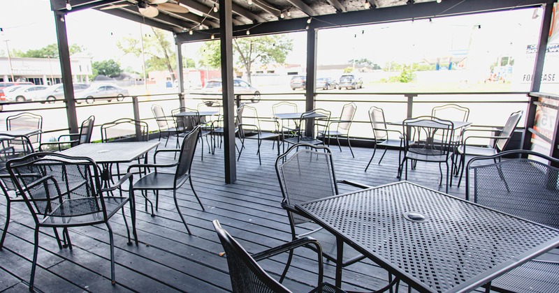 Exterior, covered patio, tables and chairs