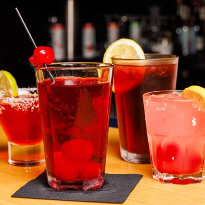 Various cocktails served on the bar counter.