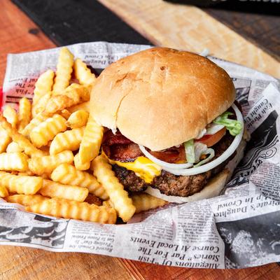 A served Mega Bacon Cheese Burger.