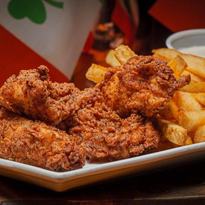 Chicken tenders and a side of fries.