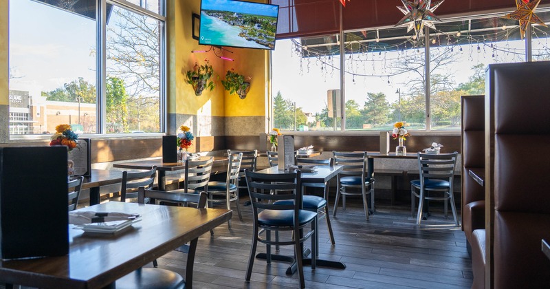 Interior, tables and chairs in dining area