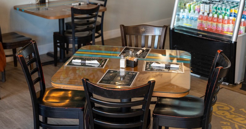 Dining table, drinks in the fridge