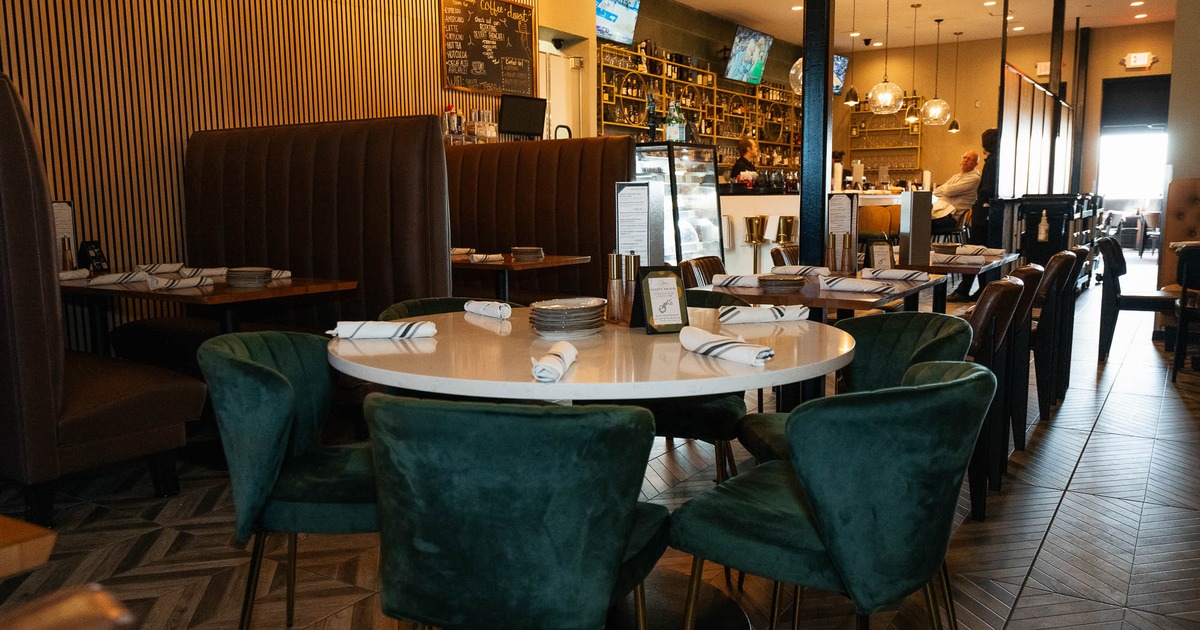 Interior, main dining area with the bar in the back