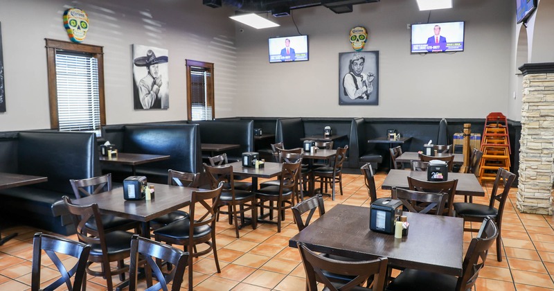 Interior, dining area with pictures on the wall