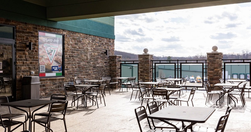 Outdoor seating area, tables and chairs