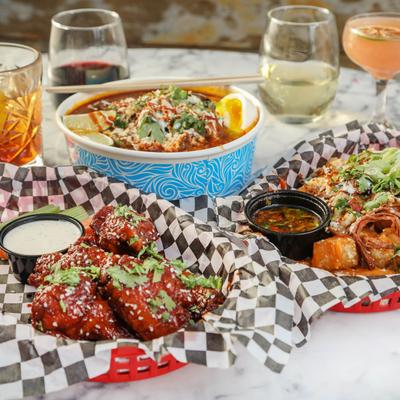 Assorted dishes, wine, and cocktails.