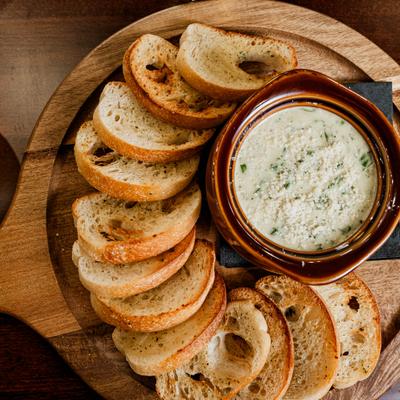 Spinach & Artichoke Dip  served with crostini.