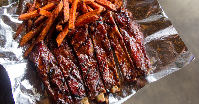 Ribs with fries on the side, top view