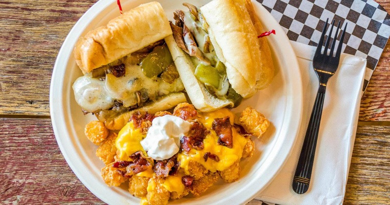 Philly Cheesesteak sandwich, with loaded tater tots
