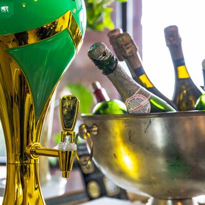 Sparkling wine bucket and a drink dispenser.