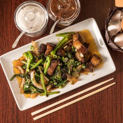 Stir-fry crispy pork belly.