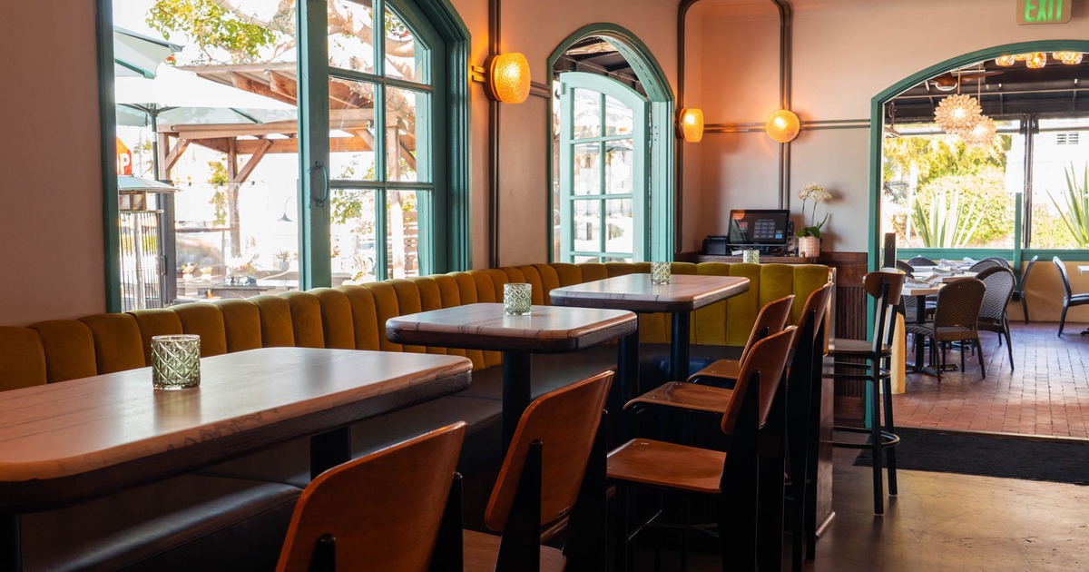 Interior, seating area, tables ready for guests