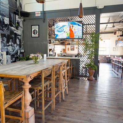 Interior, wooden bar chairs and tables