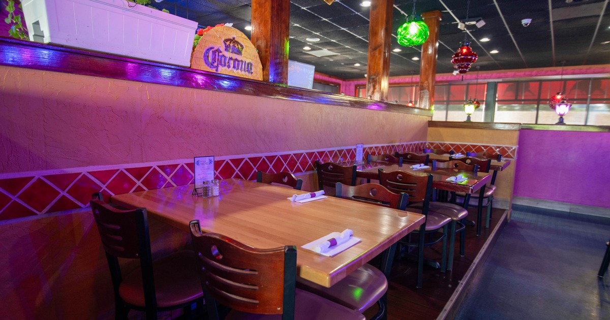 Interior, dining area, wooden top tables for four, wooden chairs
